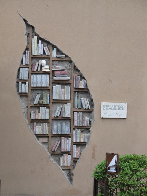 sculpture on the outside walls of the Community Library in Monzuno, Italy - Flickr - Photo Sharing! Beautiful Bookshelf, Community Library, Dream Library, Bookshelf Design, Home Libraries, Book Storage, Home Library, Book Shelf, Book Nooks