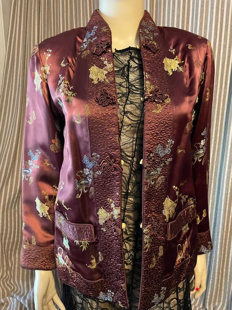 "This beautifully detailed and fully reversible Chinese jacket is a size small-medium.  The chest measures 36\" around under arms.  One side is a rich chestnut brown with subtle colored floral brocade designs, top stitching borders, frog closures and pockets.  The reverse side is a light golden color, with all the details.  There are no labels for fabric content but it feels like a satin silk.  Very nice condition.  As is, no returns." Chinese Silk Jacket, Brocade Designs, Chinese Jacket, Vintage Windbreaker, Silk Jacket, Chestnut Brown, Red Skirts, Satin Silk, Golden Color