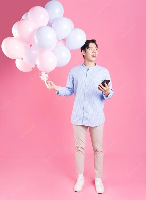 Premium Photo | Photo young asian man holding balloon on pink background Asian Man, Photo Photo, Art References, Asian Men, Premium Photo, Pink Background, Ladies Day, Mens Gifts, Art Reference