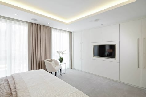 London Square Fulham Show Home Specification Wardrobes Over Bed, Window Wardrobe Design, Living Room Decor On A Budget, London Square, Bedroom Cupboards, Dressing Table Design, Living Room Tv Unit Designs, Living Room Tv Unit, Home Decor Boxes