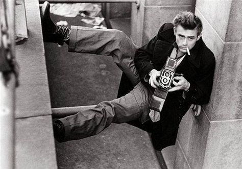 James Dean with a Rolleiflex sitting in a window well inside his apartment. New York, 1954. Dennis Stock, Holding A Camera, Xavier Samuel, Lee Strasberg, Berlin Museum, Jimmy Dean, Edward Norton, Robert Frank, Melanie Griffith