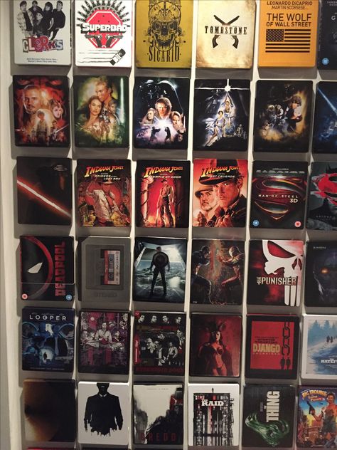 Steelbook bluray display wall - Star Wars - bvs - Indy - geek - fan boy - batman - DVD display wall - geek design - film lover - games room Steelbook Collection Display, Steelbook Wall, Dvd Display Ideas, Movie Collection Display, Movie Display, Movie Storage, Dvd Display, Small Hotel Room, Film Decor