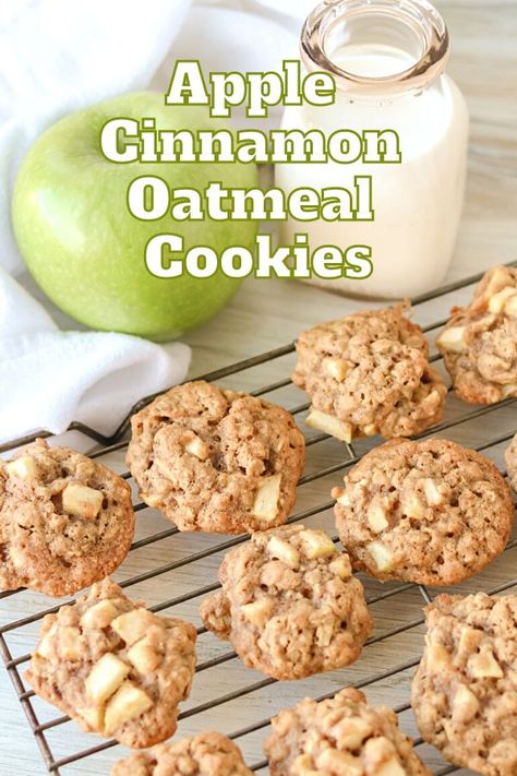 Apple Cinnamon Oatmeal Cookies cooling on a baking rack with a glass of milk and a Granny Smith apple. Chewy Apple Cinnamon Oatmeal Cookies, Apple Spice Oatmeal Cookies, Apple Cinnamon Breakfast Cookies, Cinnamon Apple Oatmeal Cookies, Fresh Apple Oatmeal Cookies, Oatmeal Cinnamon Chip Cookies, Oatmeal Snickerdoodle Cookies, Oatmeal Cookie Mix Recipes, Apple Cookies Recipes Easy