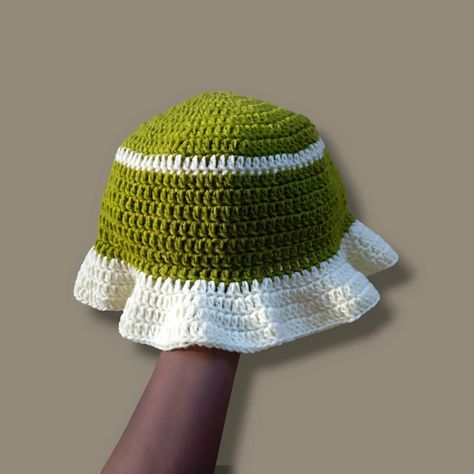 Stylish, sustainable, and handmade with love 💚🤍 This green and cream crochet bucket hat is the perfect blend of fashion and eco-consciousness! #HandmadeFashion #CrochetBucketHat #EcoFriendlyStyle #buckethat #crocheters#CrochetBucketHatStyle #crochetbeanie #unisex Crochet Bucket, Crochet Bucket Hat, Eco Friendly Fashion, Crochet Beanie, Handmade Fashion, Handmade With Love, Consciousness, Bucket Hat, With Love