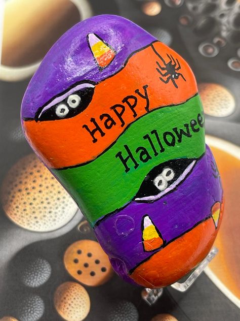 Hand Painted Rock Glow in the Dark Eyes Happy Halloween - Etsy Painted Rocks Kids Easy, Faith Painted Rocks, Halloween Stone Painting, Things To Paint On Rocks, Fall Painted Rocks, Spooky Painted Rocks, Fall Themed Rock Painting, Happy Halloween Art, Hay Bale Painting