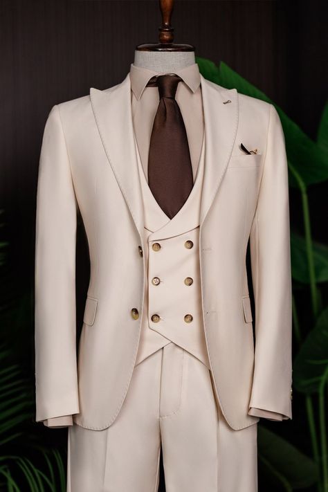 Illuminate your wardrobe with the Beige Modern-Fit Suit 3-Piece, designed to capture the essence of sunlit sophistication. The suit’s tailored modern fit and light beige hue create a look that radiates contemporary elegance. Perfect for daytime events or garden weddings, this suit ensures you shine with refined confidence and effortless style.

#singlebreasted #beigesuit #tuxedo #suit #suits #slimfit #menstyle #menfashion #fashioninspo Blazer Waistcoat, Bow Tie Suit, Modern Fit Suit, Suit Styles, Suit Stores, Slim Fit Suit Men, Beige Suits, Fancy Gowns, Garden Weddings