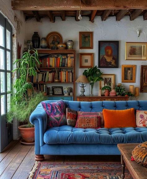 Living Room Inspo Maximalist, Diagonal Room Layout, Eclectic House Interior, Eclectic House Aesthetic, Happy House Aesthetic, Cozy Cluttered Living Room, Cottage Pop Aesthetic, Turquoise Couch Decor, Farmhouse With Color Pop