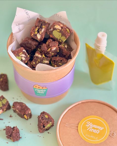 Chunky Choc Pistachio Cookie Tub Is NOW LIVE 💚 Indulge in our gourmet Chocolate Pistachio Chunky Cookies, baked with rich Belgian chocolate and real pistachios 🤩 Enjoy a delicious flavor explosion with every bite! Order your tub for delivery in 🇦🇪 #ShopNow : https://sugaholic.com/desserts/Chunky-Cookies/pistachiocookietub #Sugaholic #cookiesindubai #cookietubs #chunkycookies Pistachio Cookie, Chunky Cookies, Brownie Packaging, Bakery Packaging Design, Brownie Pops, Chocolate Pistachio, Pistachio Cookies, Dessert Packaging, Cookie Business