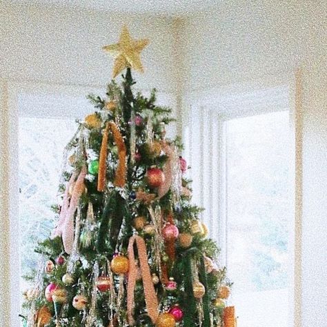 Courtney Kennedy on Instagram: "This year’s tree is chaotic and very pink and full of tinsel and velvet ribbon and we are all very into it." Kitsch Christmas, Happy December, Velvet Ribbon, Our Home, Kitsch, This Year, Ribbon, Velvet, Christmas