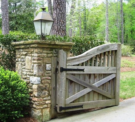 Gated entry - love the wood gate instead of wrought iron - friendlier! Driveway Entrance Landscaping, Farm Entrance, Ranch Gates, Wooden Gate, Driveway Entrance, Farm Gate, Driveway Landscaping, Wood Gate, Stone Pillars