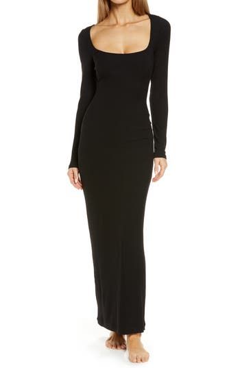 A classic everyday style, this square-neck maxi dress in ribbed stretch modal from Kim Kardashian's SKIMS hugs your body with relaxed comfort. 56" length (size Medium) Slips on over head Square neck Long sleeves Unlined 91% modal, 9% spandex Machine wash, dry flat Imported Fitted Bodycon Dress, Body Hugging Dress, Morticia Addams, Basic Skirt, Fitted Midi Dress, Sleeveless Bodycon Dress, Amy Adams, Gowns With Sleeves, Long Black Dress