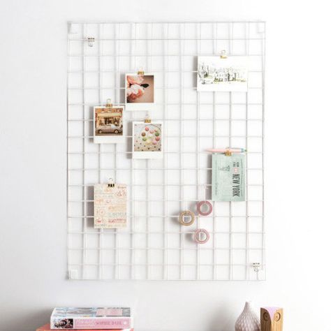 White wire grid memo board. The clean lines of this wire mesh memo-board is an inspirational organisation tool and the ideal vehicle for your creativity.  -Fittings are supplied with all of the wall-wear -Includes 6 fold-back clips and 3 ‘S’ hooks  PLEASE NOTE: Unfortunately we are unable to offer international delivery on this item. Memo Holder, Uni Room, Metal Grid, Memo Boards, Red Candy, Memo Board, Wire Mesh, Hanging Pictures, Peg Board