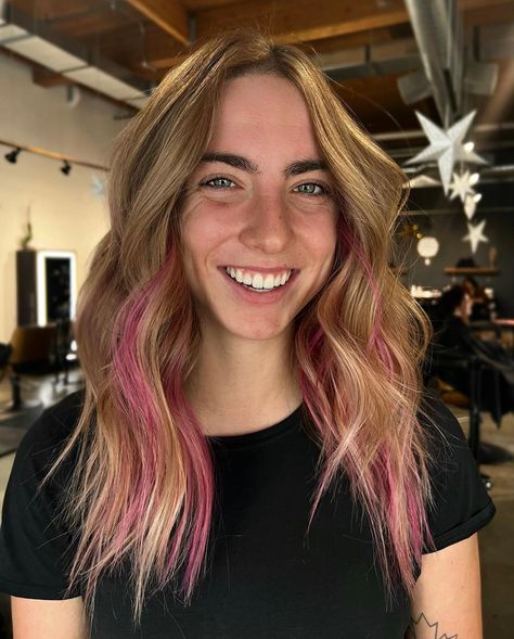 Girl smiling with blonde hair and pink pops throughout, Montana hairstylist Hot Pink Peekaboo Highlights, Fun Color Balayage Hair, Pink Underneath Hair, Pink Peekaboo Highlights, Pink Peekaboo Hair, Olivia Core, Hair Color Placement, Pink Balayage, Look 2023