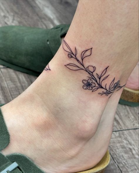 Super cute wrap around ankle vine! #ankletattoo #wraparound #wraparoundtattoo #wraparoundankletattoo #tattoos #linework Ankle Wrap Tattoo, Wrap Around Ankle Tattoos, Wrap Around Tattoo, Ankle Tattoo Designs, Wrap Tattoo, Ankle Tattoos, Ankle Tattoo, Ankle Wrap, First Tattoo