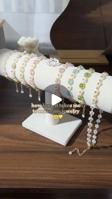 Bijoux Komorebi on Instagram: "this is my current speed. it used to take much longer before 😭 but with lots of practice (and having to fulfill hundreds of orders 😅), you learn how to work more efficiently over time 🥰

products in order:
✿ lotus necklace in rose quartz
✿ lotus bracelets in aqua & amethyst
✿ cherry bow earrings
✿ lotus bracelet & daisy bracelet
✿ daisy earrings
✿ daisy necklace
✿ daisy ring

all available on our website! 🌼 bijouxkomorebi.com

#handmadejewelry #beadedjewelry #daintyjewelry #beadedbracelets #beadednecklaces #aesthetic #daisybracelet #minimalstyle #aestheticstyle #beadedcherryearrings #daisyearrings" Lotus Bracelet, Lotus Necklace, Daisy Bracelet, Cherry Earrings, Daisy Ring, Daisy Necklace, Daisy Earrings, How To Work, Bow Earrings