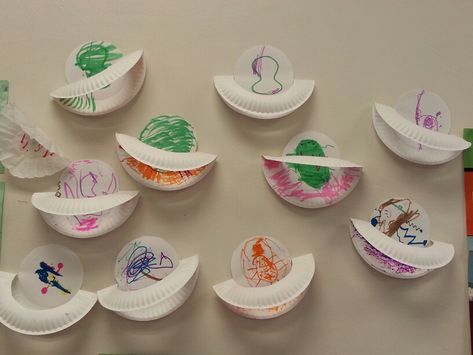 Paper plates used to make planets with rings. Solar system unit at Weber State University's Preschool. Paper Plate Planets, Planet Crafts For Preschool, Solar System Art Preschool, Solar System Crafts For Preschool, Planets With Rings, Space Crafts Preschool, Outer Space Crafts, Solar System Unit, Space Theme Preschool