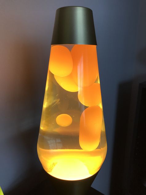 Premier lava lamp. Yellow wax and clear liquid on a gold base. Lava Lamp Room, Gold Lava Lamp, Black And White Lava Lamp, Black Lava Lamp, Tall Lava Lamp, Yellow Lava Lamp, Cool Lava Lamps, Purple And Green Lava Lamp, Crystal Photography