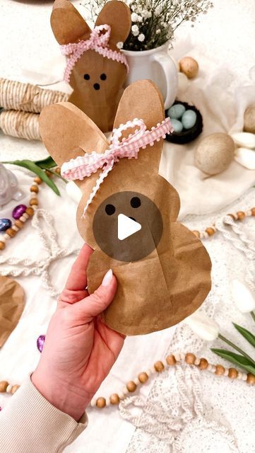 Alicia Luchini | Down Rosemary Road on Instagram: "DIY BUNNY BAGS 2.0 ~ The Girly Sweet “Peep” version Looking for something different? SAVE & MAKE these!  These bags are seriously the CUTEST!! Who doesn’t love how cute the bunny peeps are??? Why not Turn it into a treat bag. SO EASY AND FUN! 🩷🐰  What I did⬇️  Print out a bunny peep template or make your own stencil to trace. Trace it onto paper bags. Cut it out. I ran hot glue around the EDGES of the bunny body. I didn’t put any glue around the head! Draw an eyes and a nose with a sharpie. Fold both ears over. At the middle crease cut a line on each ear. Unfold and fill with a few treats. Run a ribbon through starting with the back and tie a cute bow to close your bag! Enjoy!!!💗✨  LIKE, SAVE, SHARE, AND FOLLOW ME @downrosemaryroad for Paper Bag Bunnies, Paper Bag Bunny Craft, Easter Bunny Paper Bags, Bunny Bags For Easter, Easter Bags For Kids, Bunny Paper Bag, Diy Easter Bags, Bunny Basket Craft, Paper Bag Bunny