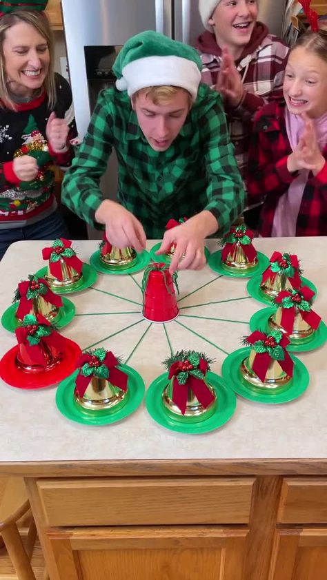 Christmas Cup And String Game, String Cup Game, Solo Cup Christmas Games For Family, Christmas Games With Solo Cups, Solo Cup Christmas Tree Punch Game, Jingle Bell Toss, Christmas Olympics, Family Christmas Party Games, Christmas Eve Games