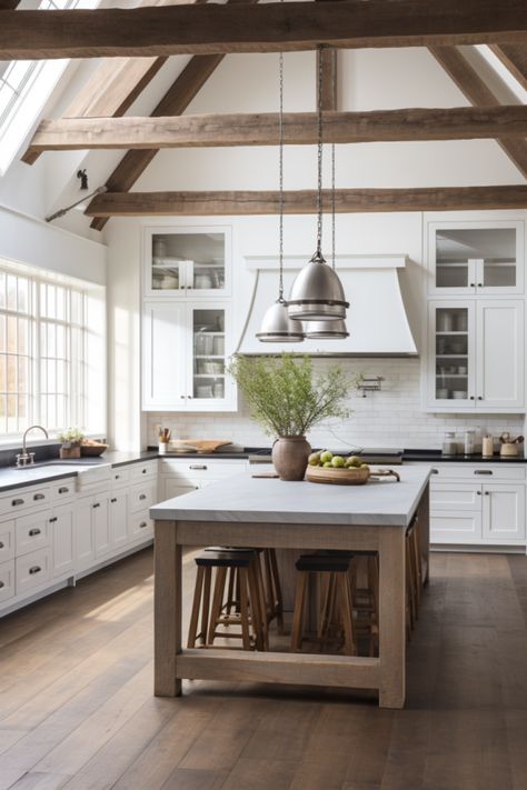 Modern farmhouse kitchen idea with exposed beams, island and modern farmhouse kitchen pendant lights. Light and airy due to large windows from above and white cabinets Kitchen Cathedral Ceiling, Kitchen With Vaulted Ceiling, White Modern Farmhouse Kitchen, Vaulted Kitchen, Modern Farmhouse Kitchen Design, Cozy Dining Room, Kitchen Ceiling Design, Vaulted Ceiling Kitchen, White Modern Farmhouse