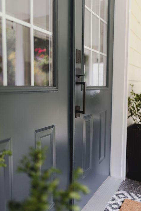 Front Door Refresh Iron Ore Front Door, Tricorn Black Front Door, Door Refresh, White House Black Shutters, Exterior House Doors, Wrought Iron Front Door, Cottage Front Doors, Iron Front Door, Unique Cottages