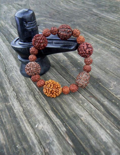 This unique mala bracelet made from genuine sacred seeds - Rudraksha, which are known as Shiva tears. You can wear this wrist seed bracelet in meditation and in your yoga practice, as well as in everyday life. Rudraksha seeds for this bracelets were energized and purified in the holy waters of river Rudraksha Jewelry, Unique Beaded Bracelet, Rudraksha Bracelet, Namah Shivaya, Om Namah Shivay, Wrist Mala, Lord Shiva Hd Wallpaper, Mala Meditation, Bracelet Wrist