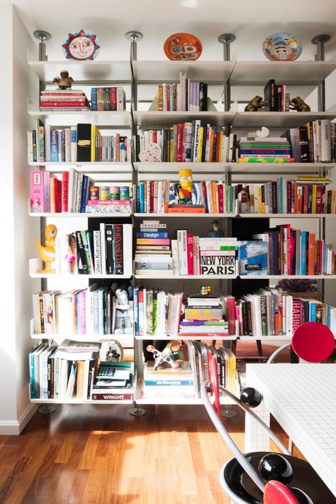 A Young NYC Collector Pays Homage to the Design of Her Generation—at Home and Online | Architectural Digest Book Storage Ideas, Eames Desk, Custom Bookcase, Unique Bookshelves, Arch Digest, Inspiring Interiors, Side Table Design, Book Storage, Nyc Apartment