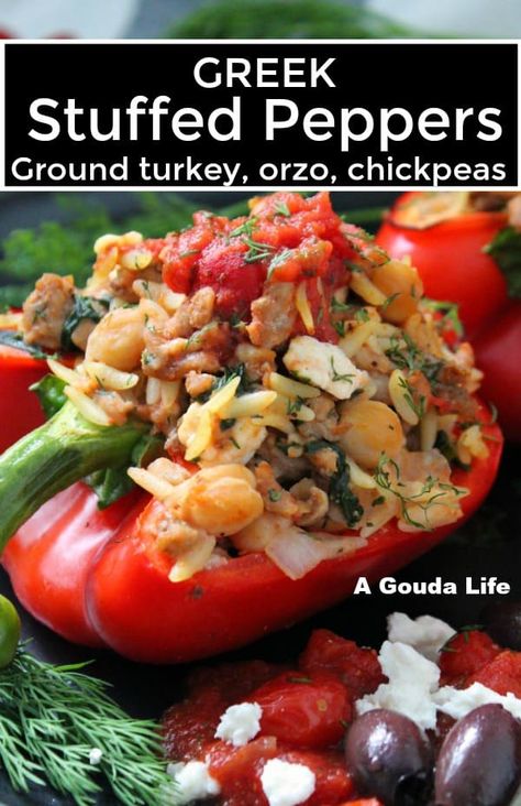 greek stuffed peppers ~ red bell peppers filled with greek seasoned ground turkey, feta, orzo, spinach and chickpeas baked in a Greek flavored tomato-herb sauce. Stuffed Peppers Ground Turkey, Ground Turkey Feta, Turkey Orzo, Orzo Feta, Greek Meals, Feta Orzo, Seasoned Ground Turkey, Mediterranean Tomato, Greek Stuffed Peppers