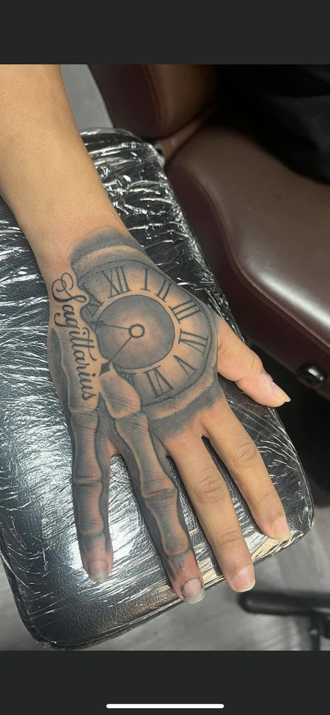 Hand Tattoos For Dark Skin Guys, Arabic Hand Tattoo, Hand Tattoos For Black Guys, Hand Clock Tattoo, Clock Hand Tattoo, Bone Hand Tattoo, Skeleton Hand Tattoos, Side Hand Tattoos, Hand Skeleton