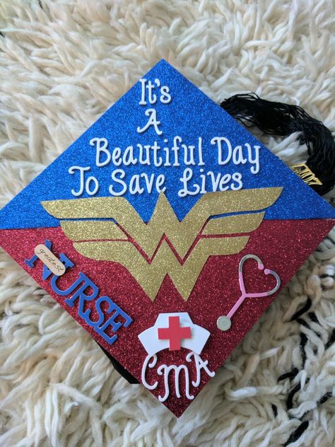 Wonder woman medical assistant graduation cap. I finally finished it just in time for my graduation pictures.. Cma Graduation Cap Ideas, Medical Assistant Graduation Cap Ideas, Medical Assistant Cap Decoration, Medical Assistant Graduation Pictures, Medical Assistant Graduation Cap, Medical Assistant Graduation, Graduation Cap Decoration Nursing, Student Pictures, Caps Ideas