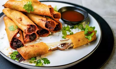 Traeger Recipes - Brisket Birria Taquitos | Traeger Grills Birria Taquitos, Smoked Tacos, Brisket Birria, Leftover Brisket Recipes, Braised Recipes, Braising Recipes, Roast Brisket, Cinco De Mayo Recipes, Grilled Chicken Tacos