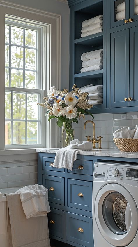 Looking to upgrade your laundry room? 🧺 Explore 40+ of the best laundry room ideas to inspire you! From sleek and modern designs to functional and organized spaces, these ideas will help you create a stylish and efficient laundry area that makes chores a breeze. Whether you have a small nook or a spacious room, find the perfect inspiration to transform your laundry space into something you'll love. #LaundryRoom #HomeOrganization #InteriorDesign #LaundryRoomInspiration #HomeDecor Stylish Laundry Room Ideas, Grand Millennial Laundry Room, Blue Laundry Room Cabinets, Laundry Room Layout Floor Plans, Chic Laundry Room Ideas, Best Laundry Room Ideas, Chic Laundry Room, Blue Laundry Room, Narrow Laundry Room