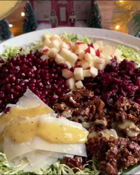 Eating Healthy on Instagram: "Shaved brussels sprout salad by @crowded_kitchen with pomegranate, apple, dried cranberries, candied pecans, shaved parmesan and a creamy lemon dijon vinaigrette, aka my FAVORITE holiday salad!! 🥗 It’s absolutely packed with different flavors and textures, and it’s refreshing, tart, sweet, salty and perfect for the holidays. And yes, you can make it in advance! It tastes even better after sitting in the fridge for 12-24 hours so the brussels have time to soak up lots of flavor. When it comes to shredded brussels sprouts, you can either use the shredding attachment on a food processor, a mandoline, a knife (if you’re super skilled!) or the easiest: just buy them pre-shredded at the store. We like to shred them really finely so you don’t get any huge pieces Crowded Kitchen Shaved Brussel Sprouts, Shaved Brussel Sprout Salad With Pomegranates And Candied Pecans, Shaved Brussels Sprouts Salad With Pomegranate And Candied Pecans, Shaved Brussels Sprout Salad With Pomegranate And Candied Pecans, Creamy Lemon Vinaigrette, Shaved Brussel Sprout Salad, Salad Meals, Brussel Sprout Salad Recipes, Holiday Salad