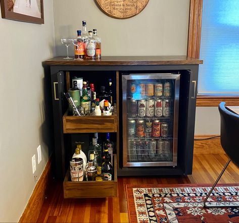 Small Drink Bar Ideas, Office Mini Bar Ideas, Very Small Bar Ideas, Drink Fridge In Living Room, Liquor Area Ideas, Tiny Basement Bar Ideas, Mini Bar Cabinets For Home, House Bar Ideas Small Spaces Liquor, Diy Bar Cart With Mini Fridge