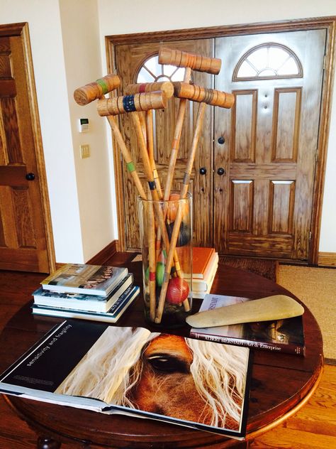 Table centerpiece with croquet mallets Croquet Set Repurpose, Vintage Croquet Set Decor, Croquet Decor, Horse Bedroom, Croquet Set, Lake Ideas, Interesting Interiors, Equestrian Decor, Camp Style