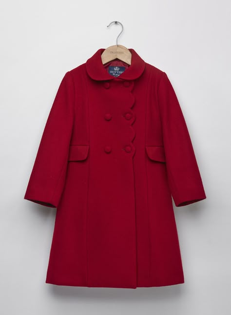 A Trotters favourite, our scalloped edge Classic Coat is made from 100% wool in a fun festive red colour. It comes with a matching smart red velvet collar, buttons and trim; a must-have winter piece.