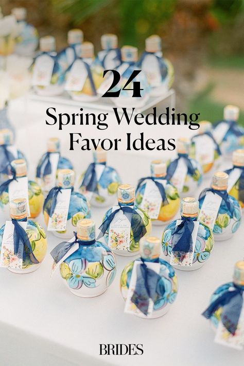 If you're planning a destination wedding, mini bottles of a local delicacy are always appreciated. At this Italian wedding, guests took home limoncello bottles, and the lemon-flavored liquor feels just right for any springtime wedding. See more ideas at the link. Italian Wedding Guest Gifts, Wedding Limoncello, Italian Wedding Favours Ideas, Italian Wedding Party Favors, Mini Limoncello Bottles, Italian Wedding Favors For Guests, Wedding Favors Italian, Limoncello Wedding Favor, Liquor Party Favors