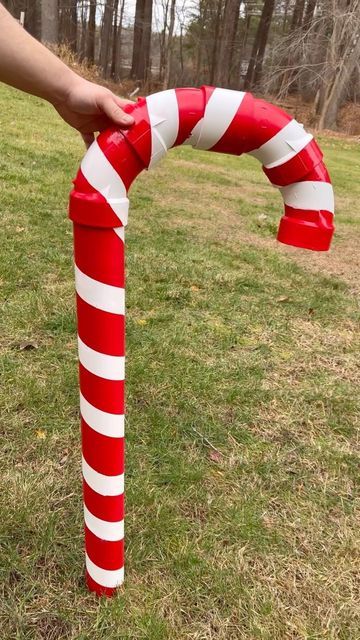 Pvc Candy Cane Diy, Giant Candy Cane Decorations, Pvc Candy Canes, Christmas Reels, Giant Candy Cane, Candy Cane Decorations, Tv Stand Decor, Christmas Mail, Giant Candy