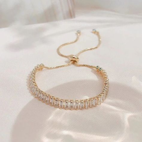 Fancy Beautiful Up Down Zirconium Bracelet✨💛 Best Quality 💯 Price 399/- PKR . . . . . . . . PR/39 . #jewelrylovers #fashionaccessories #handmadejewelry #statementjewelry #blingbling #jewelrydesign #gemstonejewelry #luxuryjewelry #instajewelry #shopsmalljewelry #zirconjewelry #pkonlinestore #onlinejewellerypakistan #jewelrypage #necklace #ringsofinstagram #girlsbracelet #ringsforher #earringsofinstagram #zirconearrings #stonejewellery #trendyjewelrypieces #explore #explorepage #fashionfor... Copper Chain Bracelet, Titanium Bracelet, Luxury Bracelet, Hand Bracelet, Birthday Jewelry Gift, Gold Plated Bracelets, Bracelets For Women, Rhinestone Bracelet, Rhinestone Jewelry