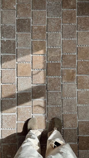 Lone Fox by Drew Michael Scott on Instagram: "I wanted the look of reclaimed antique cobblestone / tile in my kitchen but the actual old stuff costs a FORTUNE! I used these tumbled travertine tiles to create a similar look for less. Still deciding on the grout color 🤌🏻" Spanish Tile Kitchen, Modern Spanish Style Homes, Spanish Inspired Home, Modern Spanish Style, Lone Fox, Entry Tile, Exterior Tiles, Spanish Style Home, Tile Kitchen