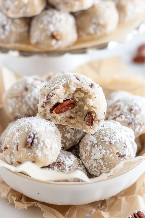 Christmas is nearly upon us, and to celebrate, I’m excited to share one of our cherished treats: butter pecan snowball cookies! These cookies are a simple yet classic addition to your holiday baking lineup, perfect for whipping up at the last minute. Made with pecans, they boast a delightfully shortbread-like texture that we absolutely adore. Pecan Butter Balls Christmas Cookies, Healthy Snowball Cookies, Pecan Butter Balls Recipe, Butter Pecan Snowballs, Pecan Drop Cookies, Italian Pecan Cookies, Buttery Pecan Snowball Cookies Recipe, Almond Pecan Cookies, Christmas Nut Cookies