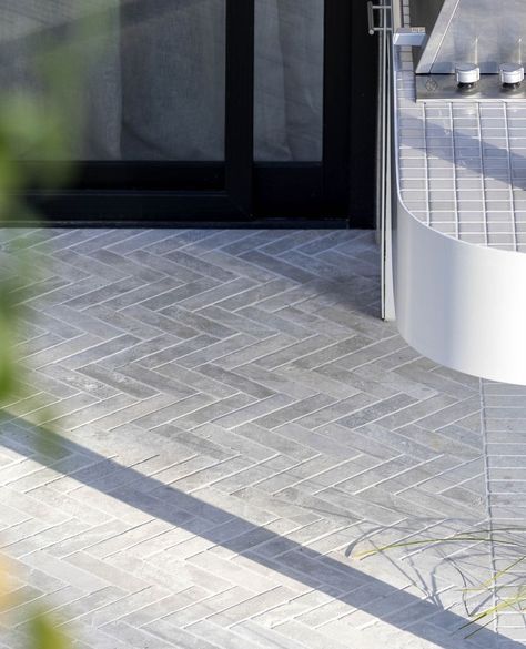 Eco Outdoor | With a smooth finish and muted mid-grey tones our Garonne limestone batons add just the right amount of texture and pattern to this… | Instagram Stone Backyard, Eco Outdoor, Texture And Pattern, Pool Photography, Herringbone Tile, Grey Tones, Contemporary Home, Outdoor Flooring, Herringbone Pattern