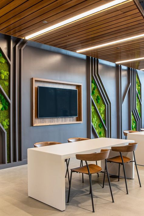 white table with wooden and black chairs, plant accent wall Timber Office Interior, It Office Design Interiors, Open Office Designs, Office Spaces Ideas Business, Office Spaces Interior Design, Flexible Office Space, Work Cafe Office, Resimercial Office Design, Workplace Design Collaborative Space