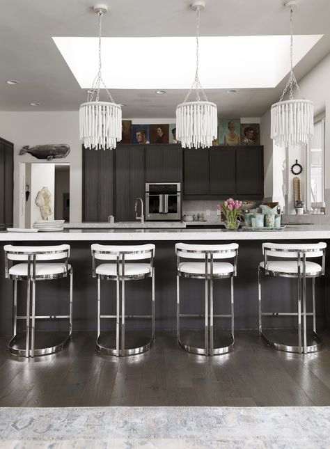 Our chrome Ballantine Stools shine in this eclectic kitchen with dark grey cabinets. Our limited runs don't last long, so claim yours while you can! Available in chrome or brass. #modernkitchen #greycabinets #greykitchen #chromekitchen #counterstool White Counter Stools, Chrome Designs, Scout Design, Dinette Chairs, How To Clean Chrome, Modern Counter Stools, Chrome Kitchen, Eclectic Kitchen, Bar Height Stools