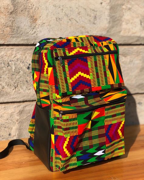 Made with leather and ankara cotton fabric. Has a padded pocket in the bag for your laptop. Traditional Multicolor Ankara Fabric And Notions, Ankara Laptop Bags, Ankara Notebooks, African Fabric Accessories, Traditional Multicolor Ankara Fabric, Ankara Bags, Ankara Fabric With Geometric Pattern Prints, Handmade Fabric Bags, Handcrafted Bags