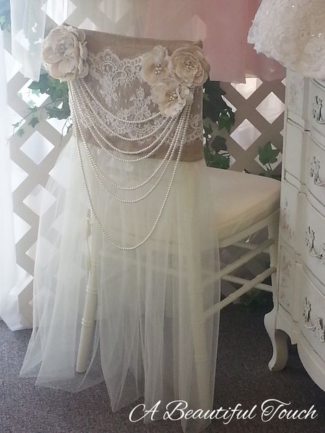 This vintage inspired chair cover is a very popular rental for Brides that are hosting their reception at a vineyard, barn or other "outdoorsy" venue. It evokes a feeling of country romance but yet has a dramatic flair with the long multi-strand pearls. It is a striking and unique rental. The Groom's chair cover is the matching burlap and alencon lace. Handmade with love by A Beautiful Touch. Bridal Chair, Wedding Chair Decorations, Chair Covers Wedding, Chair Decor, Party Deco, Wedding Chair, Chair Sashes, Rustic Bridal, Bridal Shower Rustic