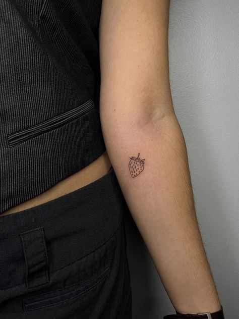 Find line strawberry tattoo done by tai Multiple Wrist Tattoos, Micro Strawberry Tattoo, Strawberry Tattoo Placement, Strawberry Small Tattoo, Strawberry Postage Stamp Tattoo, Find Line Tattoo Ideas, Heart Strawberry Tattoo, Strawberry Fields Forever Tattoo, Tiny Strawberry Tattoo