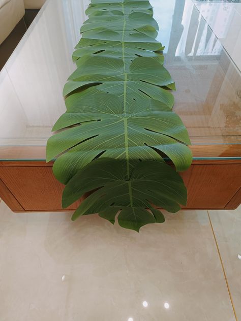 PRICES MAY VARY. Arijorja Products Include: 2 artificial palm leaf Table Runners。 Artificial Palm Leaves Table Runners: These are not individual artificial tropical palm leaves; But all the blades are connected to each other, forming a whole Table Runners; The size of a single leaf is approximately 13.4 x 11.8 inches; The length of the entire tablecloth is 72 inches, which is very suitable for Luau Theme Party and tropical Hawaiian themed party table decoration. Material: The product is made of Island Theme Party Decorations, Homecoming Decorations Hallway, Tropical Retirement Party, Palm Leaves Table Runner, Palm Tree Party, Hawaiian Cowboy, Lion King Party Decorations, Greek Party Theme, Hawaii Decorations