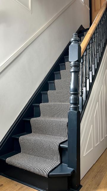 Painted Stripes On Stairs, Stripy Stair Carpet And Landing, Navy Staircase Banister, End Of Stairs Ideas, Dark Stairs Carpet, Victorian Bannister Ideas, Farrow And Ball Railings Stair Bannister, French Grey Staircase, Contrast Trim Stairs