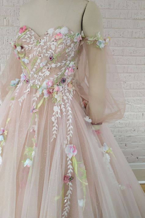 A dreamy wedding dress could be ideal for your wedding dayOur team love this gown for a fairy tale weddingCollect this inspiration to your dream gown collection. Simple Pink Wedding Dress, Fairy Themed Wedding Dress, Pink Fairycore Wedding Dress, Fairy Core Wedding Dress, Pastel Pink Wedding Dress, Fairy Princess Wedding Dress, Fairy Wedding Dresses, Pastel Pink Weddings, Ethereal Wedding Dress